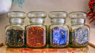 jars of colored tea leaves